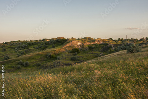 Fototapeta Naklejka Na Ścianę i Meble -  view of the hills with green grass