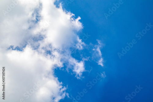Blue sky with clouds on a clear day and good weather in the morning, fluffy and soft white clouds