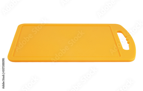 Yellow plastic cutting board isolated