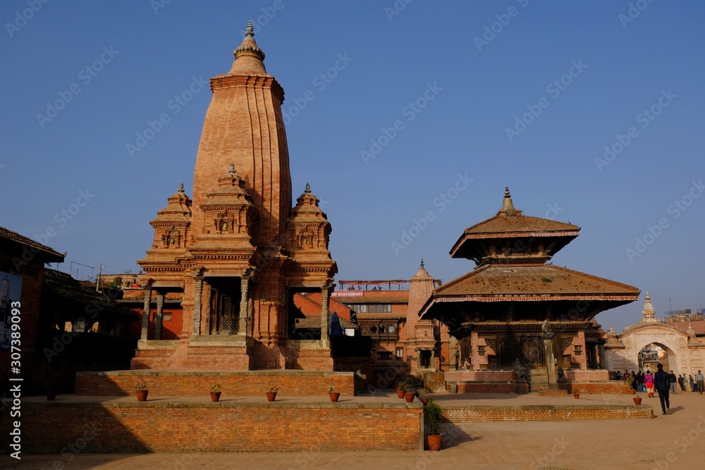 Temples on Bhaktapur Durbar Square in sunny day - Bhaktapur, Nepal