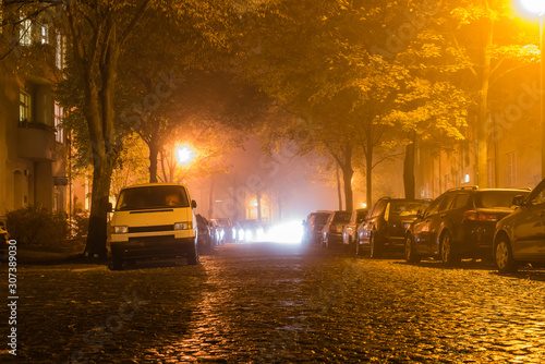 Misty cobble stone road at night, foggy road at night, Wet and foggy road, cobble stone road, 