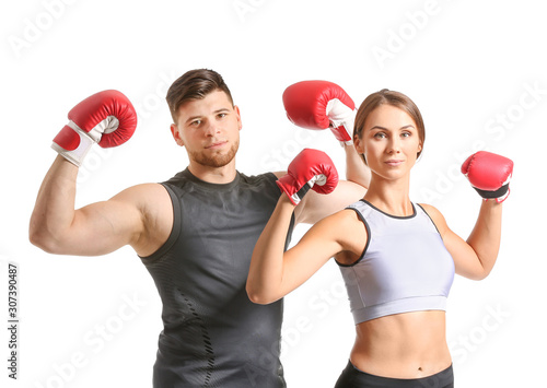 Sporty young boxers on white background
