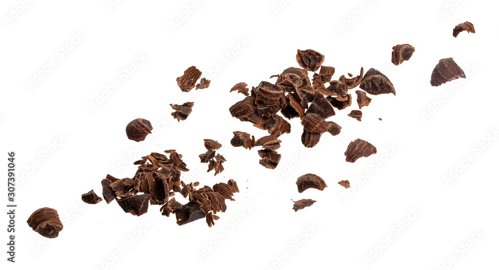 Grated chocolate pieces isolated on white background, closeup Grated chocolate pieces isolated on white background, closeup