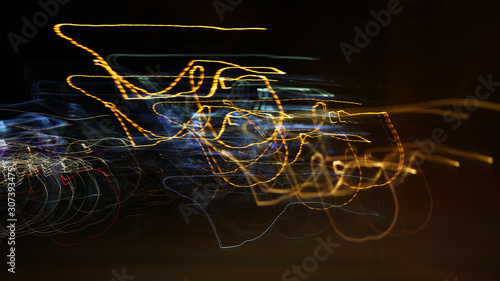 Colorful abstract line light art. Conceptual art showing motion, pulse of the city of Helsinki & darkness of the night. Created by moving camera with long exposure in the city during night