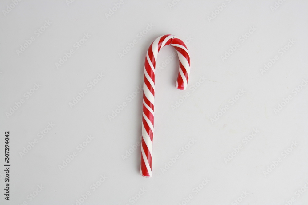 Candy stick with caramel on white background Candy stick with caramel on white background