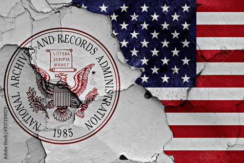 Wallpaper Mural flags of National Archives and Records Administration and USA painted on cracked wall Torontodigital.ca