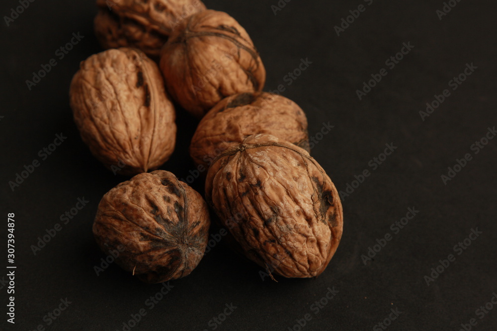 Garlic walnuts in color background Garlic walnuts in color background