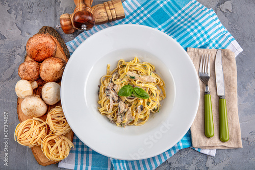 Top down view of Creamy Mushroom Fettucini Alfredo pasta. photo