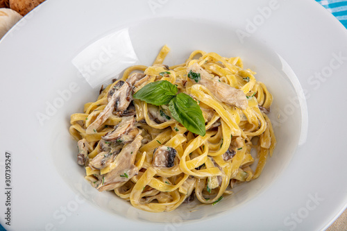 Top down view of Creamy Mushroom Fettucini Alfredo pasta. photo