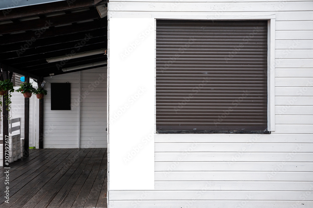Blank white vertical banner on the wall Blank white vertical banner on the wall