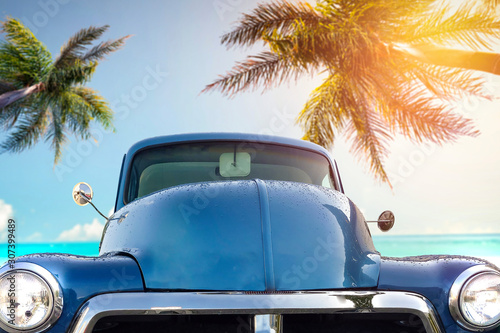Photography Summer blue car on beach and free space for your decoration