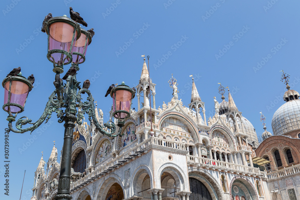 close up of Lanterns in St Marks Square or San Marco in Venice, Italy with buildings