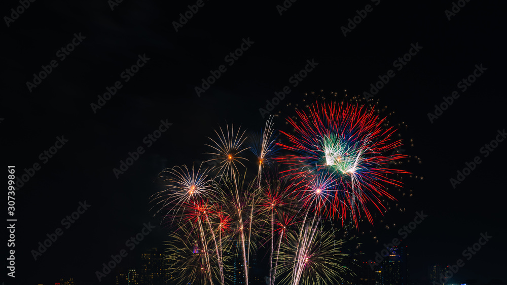Beautiful fireworks against the background as over city scape view of night city in Thailand. Beautiful fireworks against the background as over city scape view of night city in Thailand.