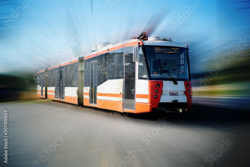 the motion blur of the public city tram or train