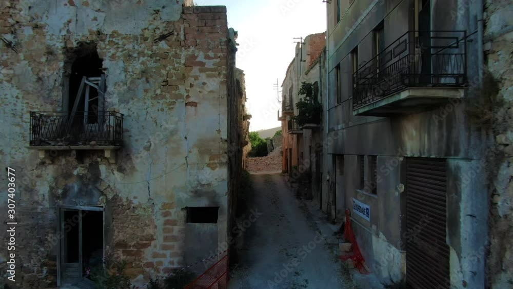 Empty and evacuated street in Ruins of Poggioreale, western Sicily, Italy, aerial Empty and evacuated street in Ruins of Poggioreale, western Sicily, Italy, aerial