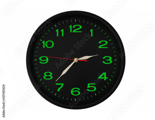 Black clock with green numbers isolated 