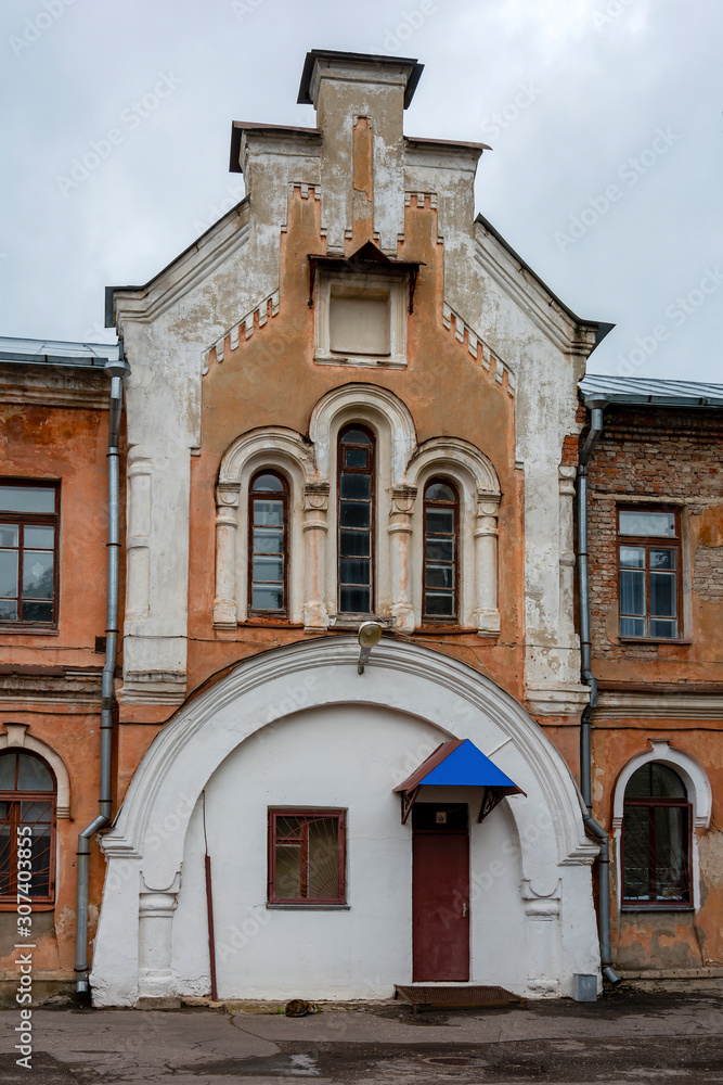Fototapeta premium Gate building of the farmstead of the Pskov-Pechersk monastery in Pskov