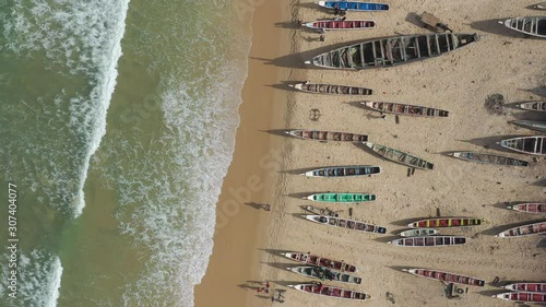 Aerial view of fishing village, pirogues fishing boats in Kayar, Senegal. Photo made by drone from above. Africa Landscapes.