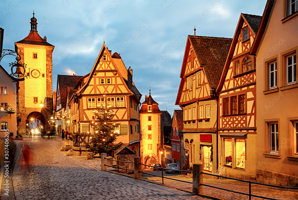 Fork in the road on Untere Schmiedgasse in Rothenburg ob der Tauber, Franconia region of Bavaria, Germany.