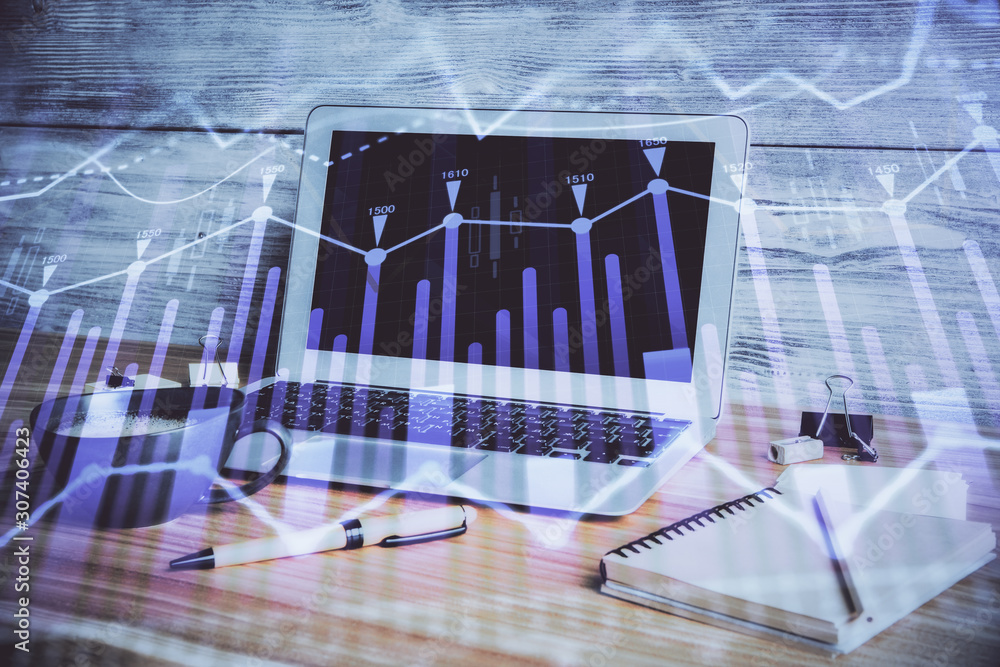 Multi exposure of forex chart and work space with computer. Concept of international online trading. Multi exposure of forex chart and work space with computer. Concept of international online trading.