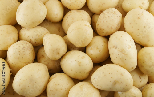 Many potatoes as background