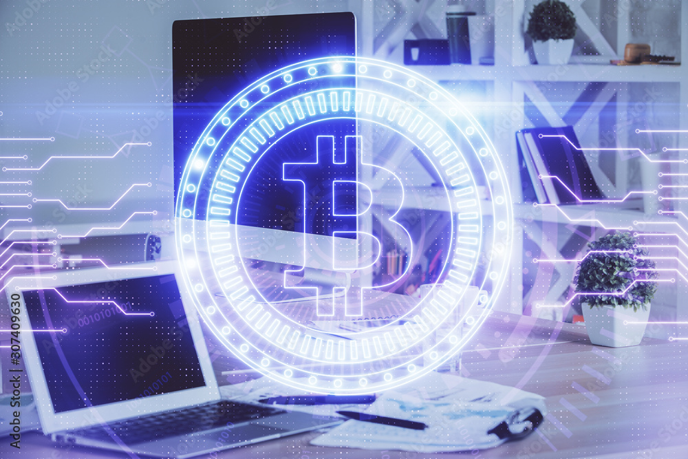 Multi exposure of blockchain theme hologram and table with computer background. Concept of bitcoin crypto currency. Multi exposure of blockchain theme hologram and table with computer background. Concept of bitcoin crypto currency.
