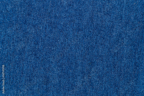 Detail of nice blue jeans textile tuxture for background with vintage tone.