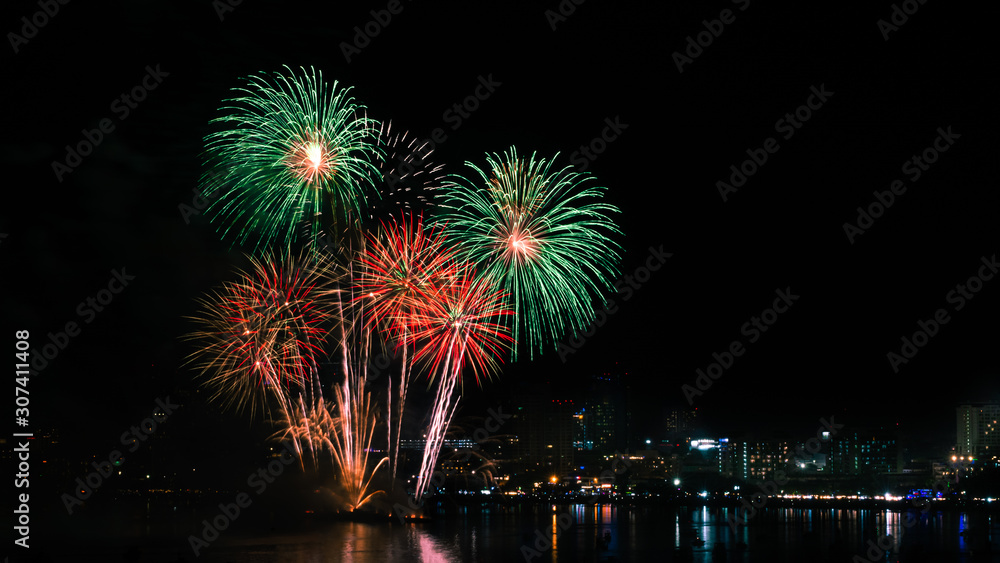 Beautiful fireworks against the background as over city scape view of night city in Thailand. Beautiful fireworks against the background as over city scape view of night city in Thailand.