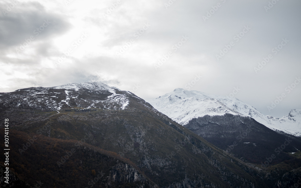 Landscape of mountains with snowy peaks in Picos de Europa in Cantabria