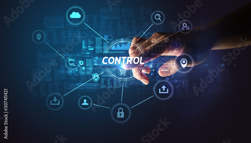 Hand touching CONTROL inscription, Cybersecurity concept