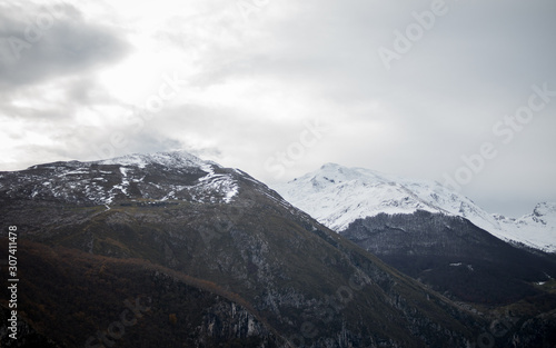 Landscape of mountains with snowy peaks in Picos de Europa in Cantabria