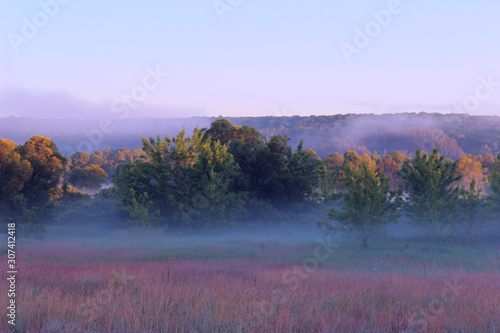 Blurred image of a beautiful landscape. Abstract nature background. Nature, fog, landscape concept.