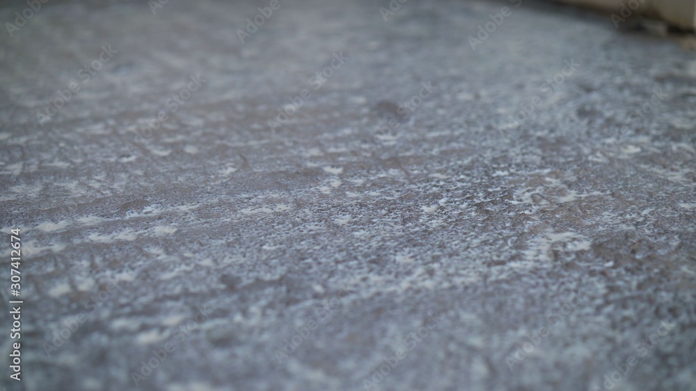 Primed concrete floor. Builders pour concrete floors. For construction. Builder primers the floors before pouring. Primed concrete floor. Builders pour concrete floors. For construction. Builder primers the floors before pouring.