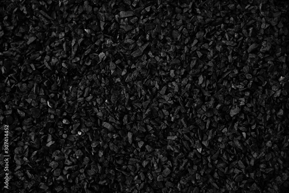 Natural fire ashes with dark grey black coals texture. It is a flammable black hard rock. Space for text. Natural fire ashes with dark grey black coals texture. It is a flammable black hard rock. Space for text.