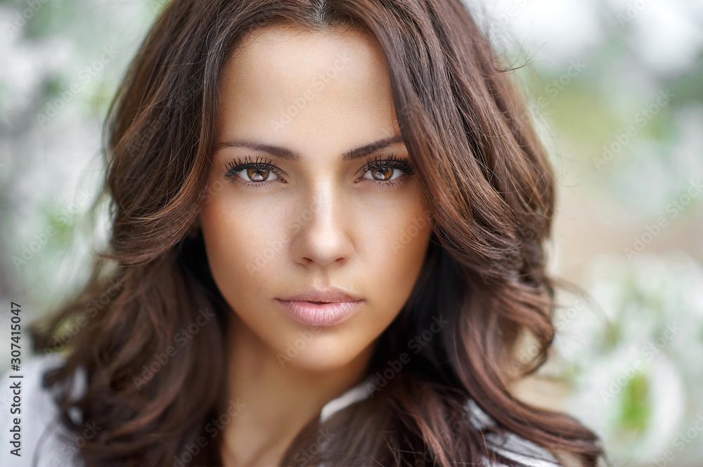 Beautiful brunette woman face close up - perfect skin Beautiful brunette woman face close up - perfect skin