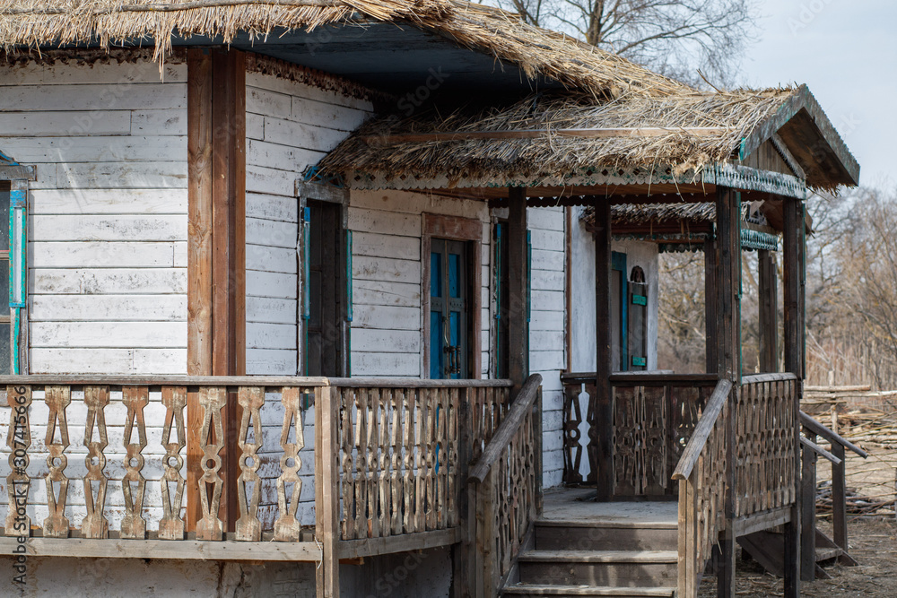 The porch of an old wooden Cossack house in a village.