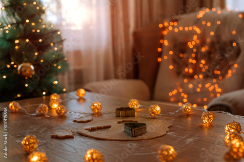 A table after the preparation of gingerbread cookies .