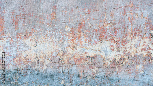 Creative abstract texture background. Beautiful turquoise, orange and grey grunge rough artistic old stone wall with cracks and scratches. Copy space
