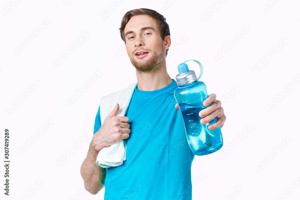 young man with bottle of water isolated on white young man with bottle of water isolated on white