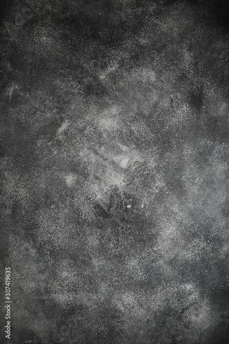 Dark moody black with grey concrete texture or background. With place for text and image