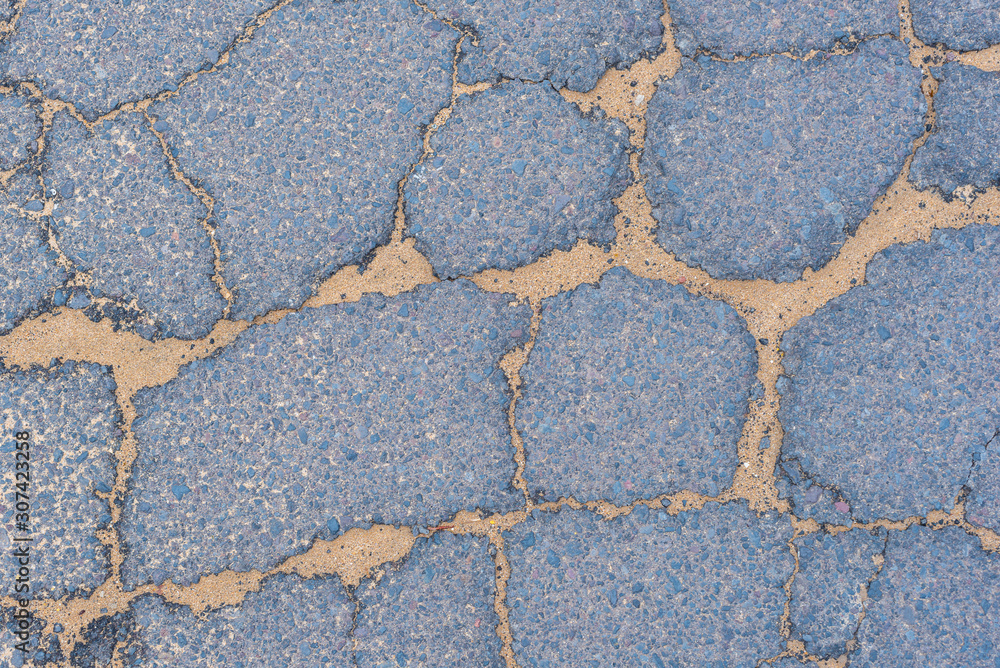 Fototapeta premium Textura de asfalto agrietado.