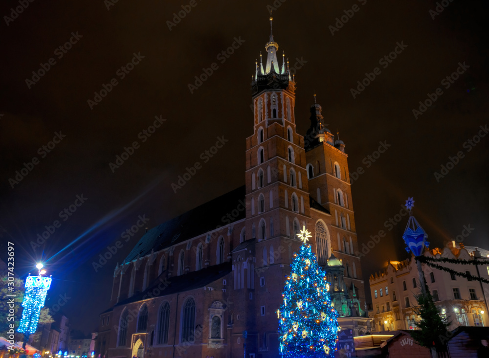 Facade and belfries of the old Catholic Mariack Cathedral in Krakow, Poland