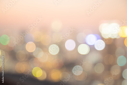 Bokeh  light in the fastival in the evening at Bangkok , Thailand. Abstract bokeh yellow light of the city in night time and soft color.