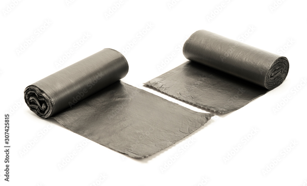 Roll of black plastic garbage bags isolated on the white background Roll of black plastic garbage bags isolated on the white background