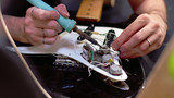 Behind the scenes of guitar making, electrical components