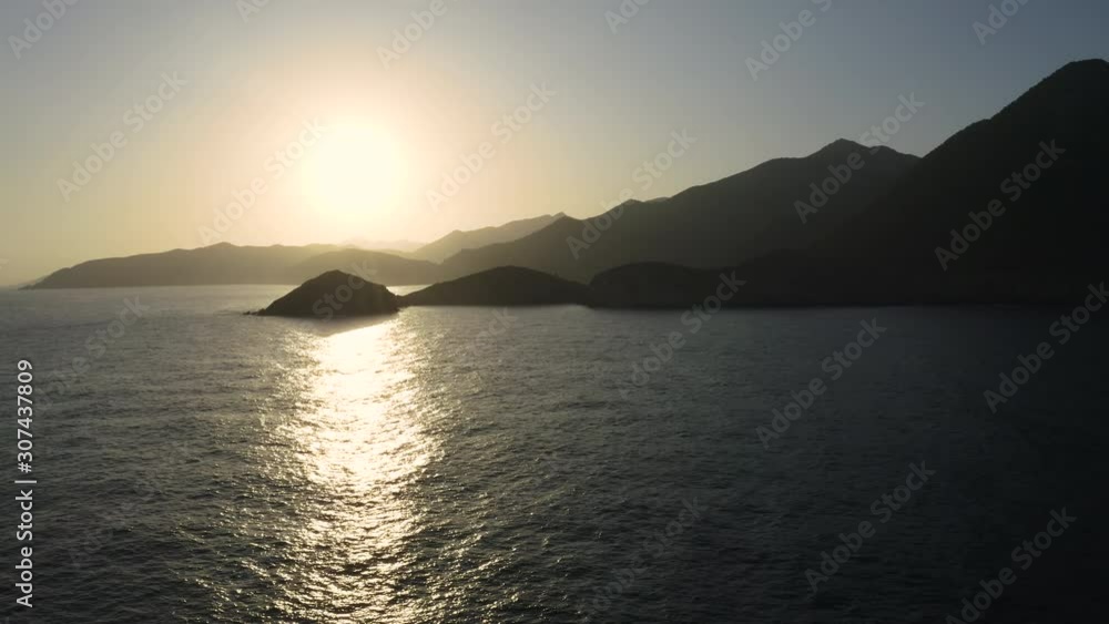 Aerial view of Reflections on Sea water surface at Sunrise. Flying above water. Aerial view of Reflections on Sea water surface at Sunrise. Flying above water.