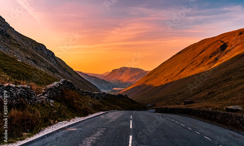 Fényképezés Scenic road at Kirkstone Pass valley in the Lake District, Cumbria, England at sunset time