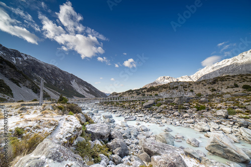 Amazing view at Hooker Valley Suspension Bridge in Mount Cook hiking trail, New Zealand.