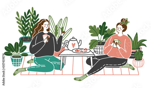 Young womans sitting on floor at home, drinking tea and talking. Friends spending time together at home with plants growing in pots. Illustration.