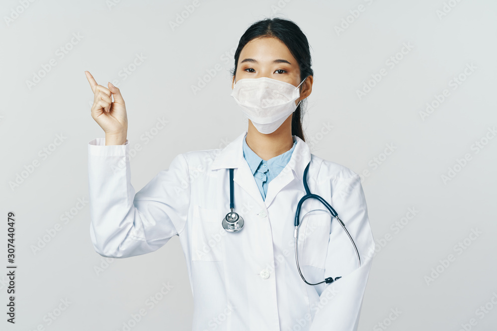 portrait of a young doctor with stethoscope isolated on white portrait of a young doctor with stethoscope isolated on white